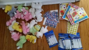 A Shipment of Stuffed Animals, Coloring Books, Stickers, and Pens 