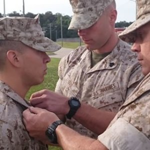 Marine getting promoted by NCOs USMC Baseball Hats Devil Dog T-Shirts